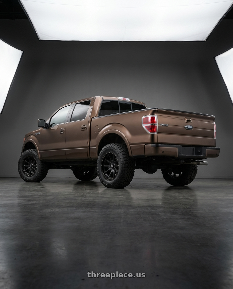 2013 Ford F-150 with KMC KM100 SYNC 6X135/6X139.7 20X9 +0 SATIN BLACK wheels rear three quarter view meaty tires