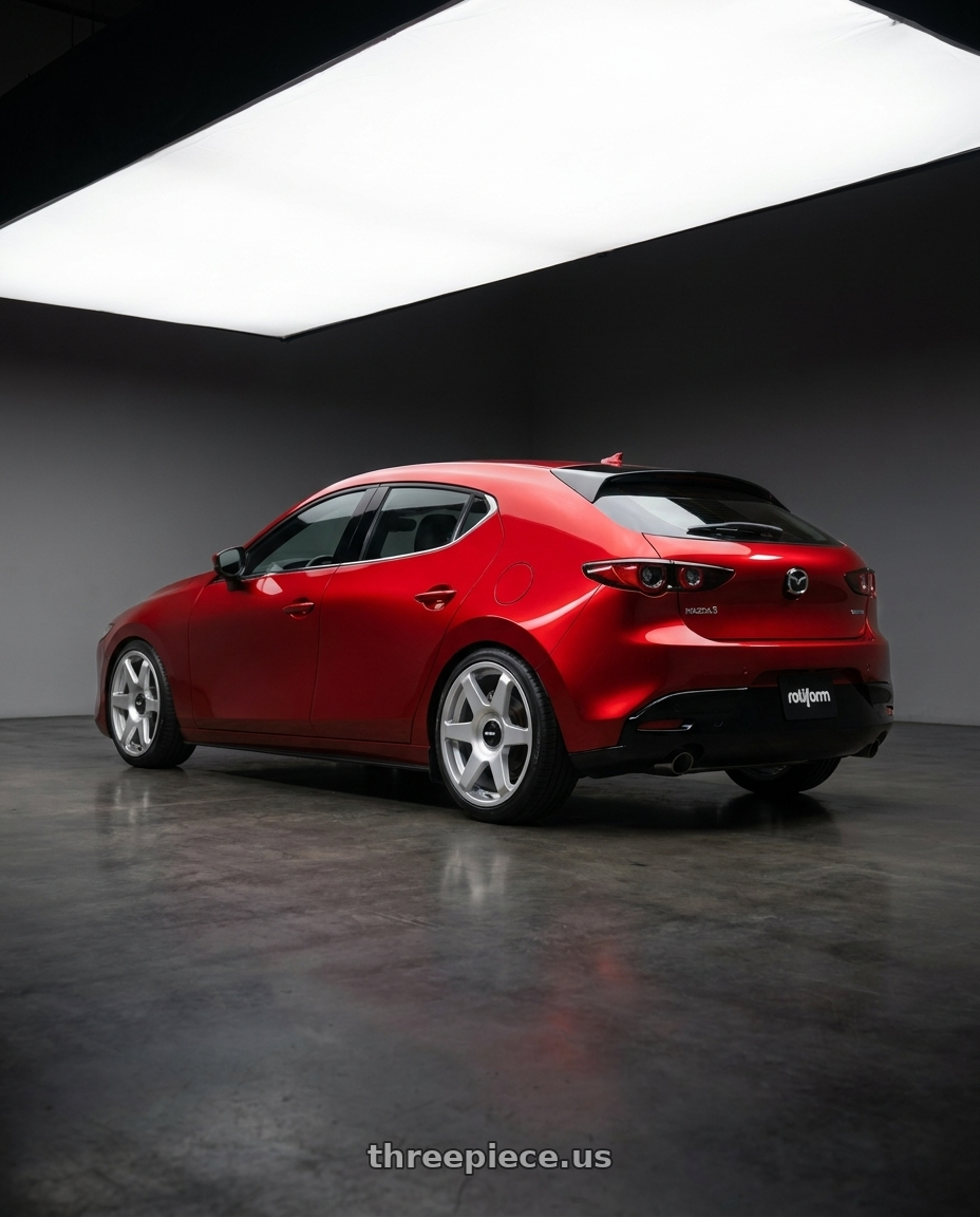 2024 Mazda 3 with Rotiform 1PC R114 SIX BLANK 19X8.5 +35 GLOSS SILVER wheels rear three quarter view slight stretch tires