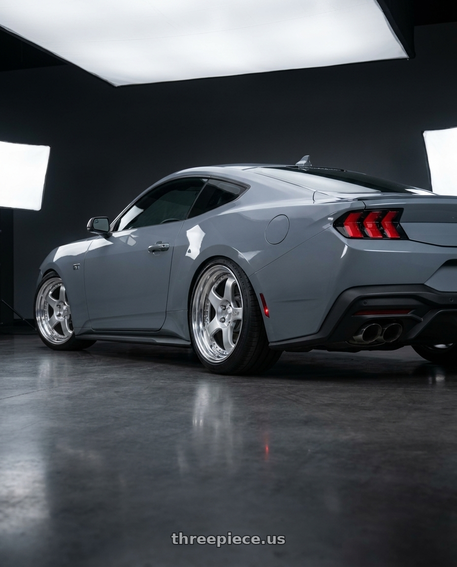 2024 Ford mustang Gt lunar grey with SSR Professor SP1 5x114.3 19X11.5+18 NR Disk Silver wheels rear three quarter view slight stretch tires