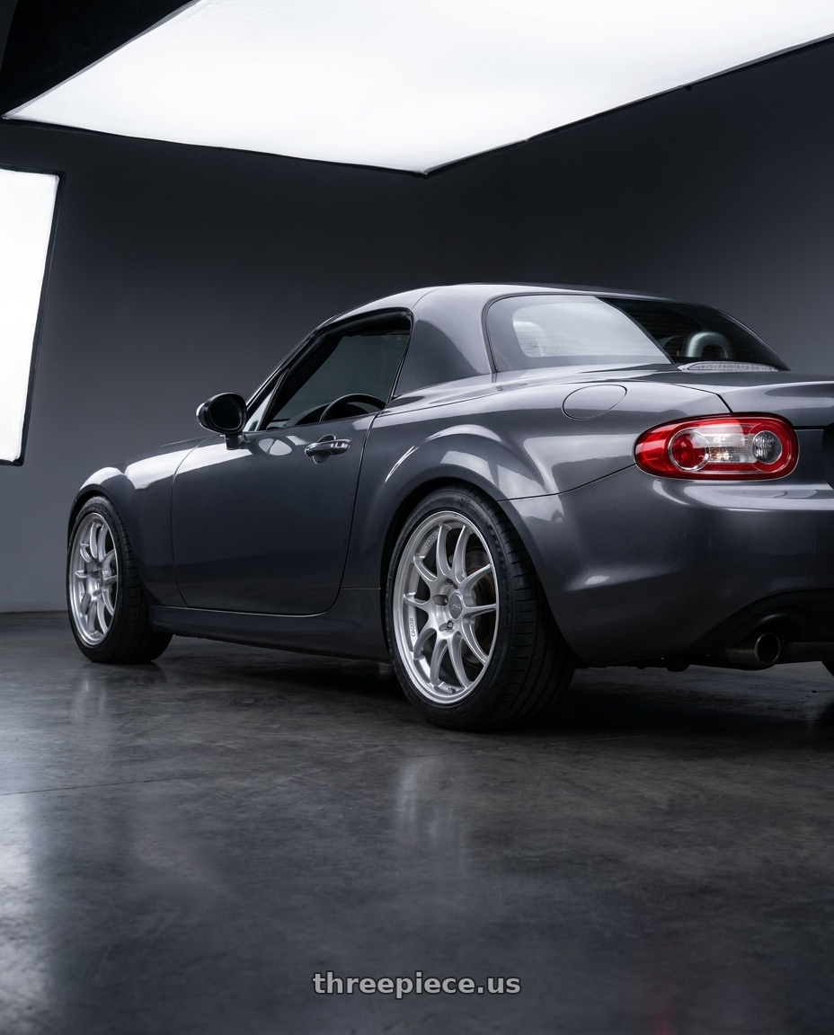 2014 Mazda Miata with Enkei PF01 5x114.3 17x7.5+38 Silver wheels rear three quarter view square tires