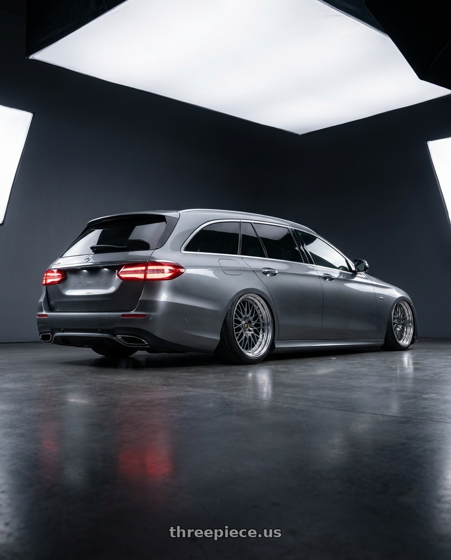 2020 Mercedes benz e300de wagon year with Work Vs-Xv 5x100 18x7+15 A Disk Brilliant Silver Black wheels rear three quarter view slight stretch tires