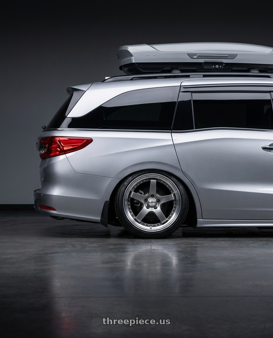2024 Honda Odyssey with SSR Professor SP4 5x120 20X7.5 30 SL Disk Titan Silver wheels rear three quarter view square tires