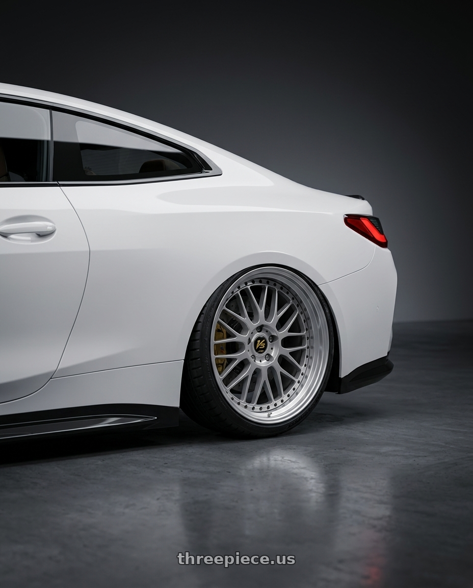2026 bmw m4 with Work Vs-Xx 5x100 18x7+51 A Disk Light Grey Silver wheels rear three quarter view slight stretch tires
