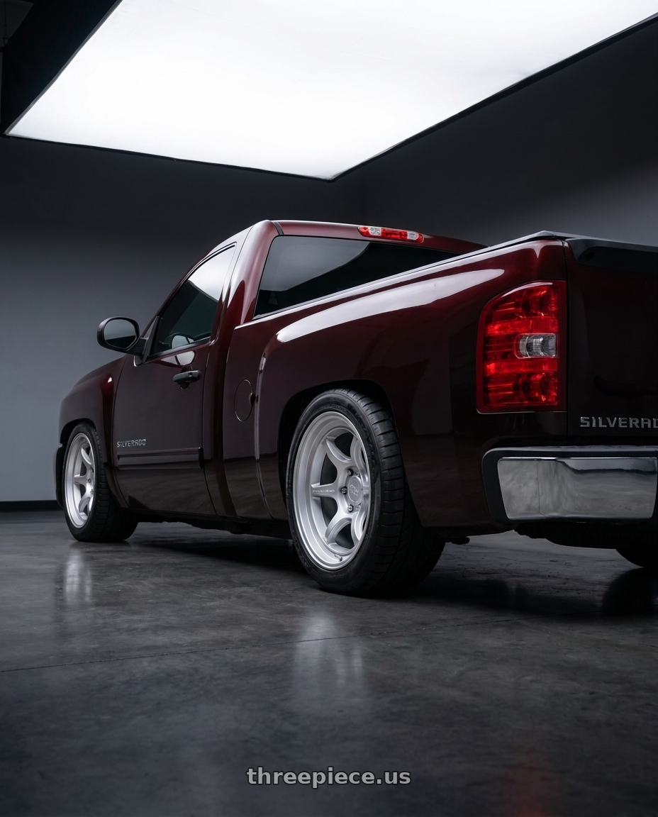 2008 chevy silverado  with Black Rhino SHOGUN 6X139.7 17X9 -38 HYPER SILVER wheels rear three quarter view meaty tires