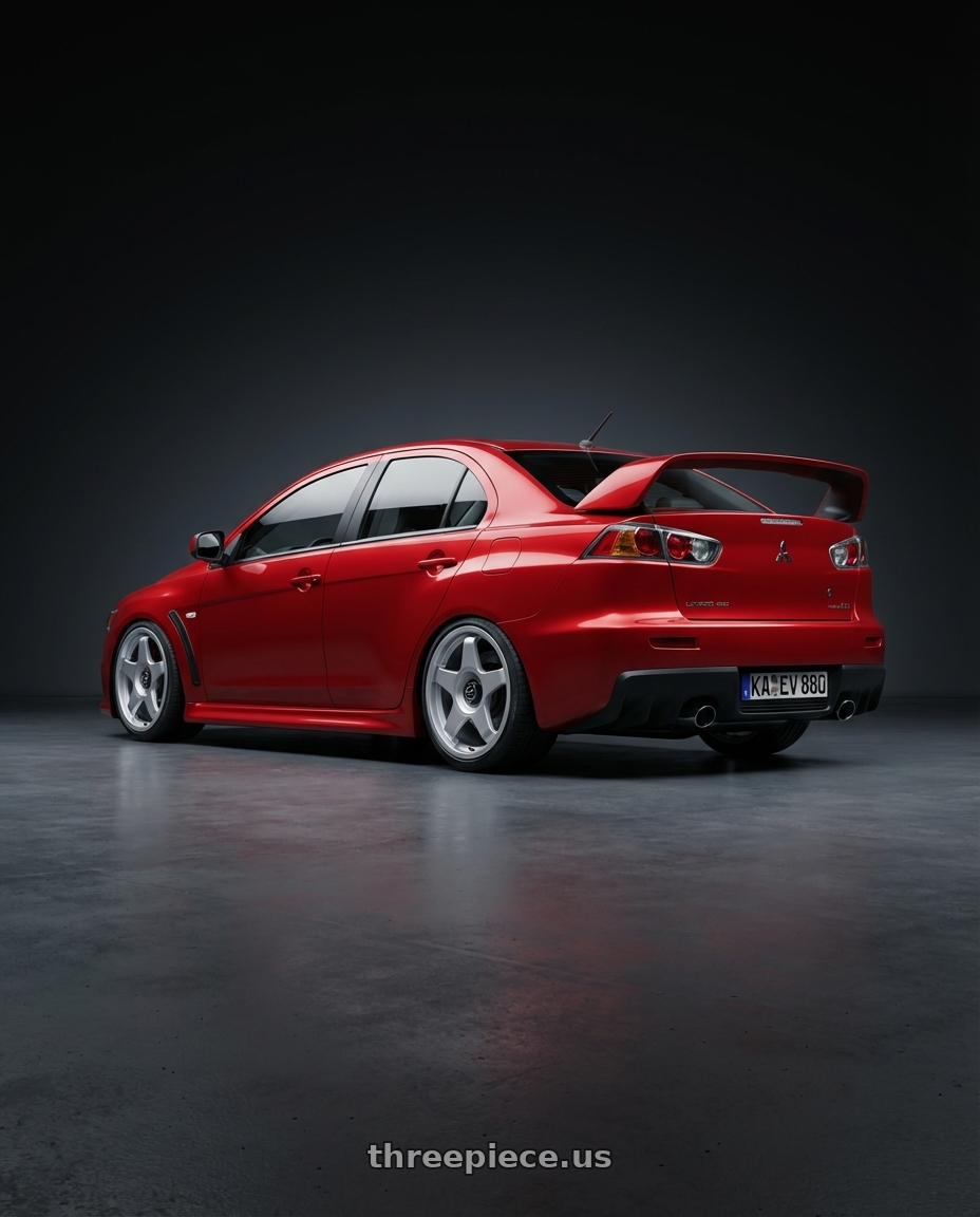 2012 Mitsubishi Lancer Evo X with fifteen52 CHICANE 5x114.3 / 5x100 18x8.5 +35 SPEED SILVER (GLOSS SILVER) wheels rear three quarter view slight stretch tires