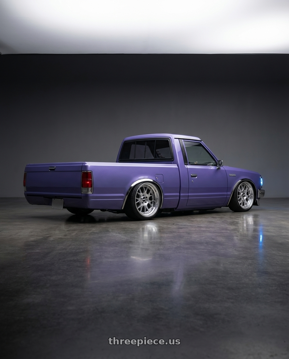 1985 Nissan 720 with BBS CH-R 5x130 19x12 +45 Brilliant Silver Polished Rim Protector wheels rear three quarter view slight stretch tires