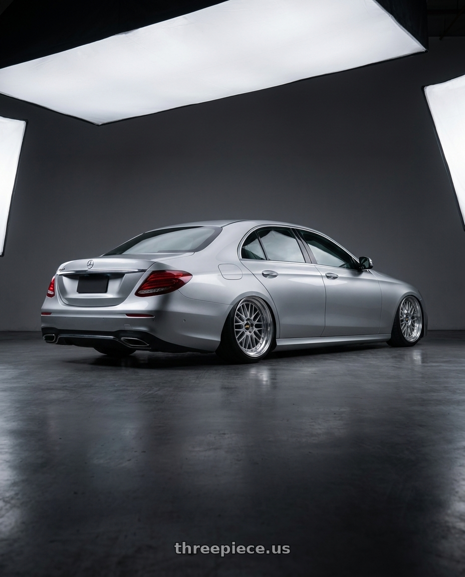 2020 Mercedes W213 with BBS LM 5x114.3 20x10.5+20 Diamond Silver wheels rear three quarter view slight stretch tires