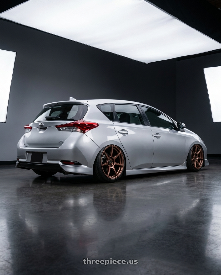 2016 Scion iM with Enkei TFR 5x114.3 17x9+40 Copper wheels rear three quarter view slight stretch tires