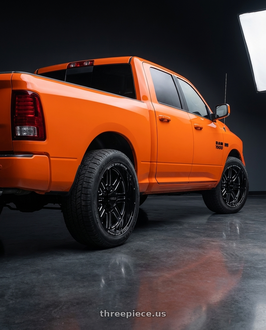 2017 RAM 1500 with WELD Off-Road Chasm 5x139.7 20x10 -25 Gloss Black/Milled wheels rear three quarter view square tires