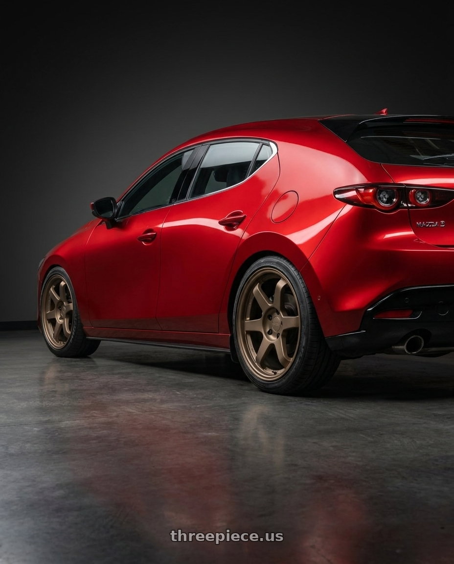2024 Mazda 3 with 9six9 SIX-1 5x112 19X8.5 +35 Matte Bronze wheels rear three quarter view slight stretch tires