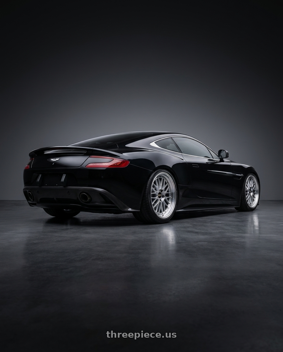 2025 Aston Martin Vanquish Black with BBS LM 5x114.3 18x8.0+35 Diamond Silver wheels rear three quarter view square tires