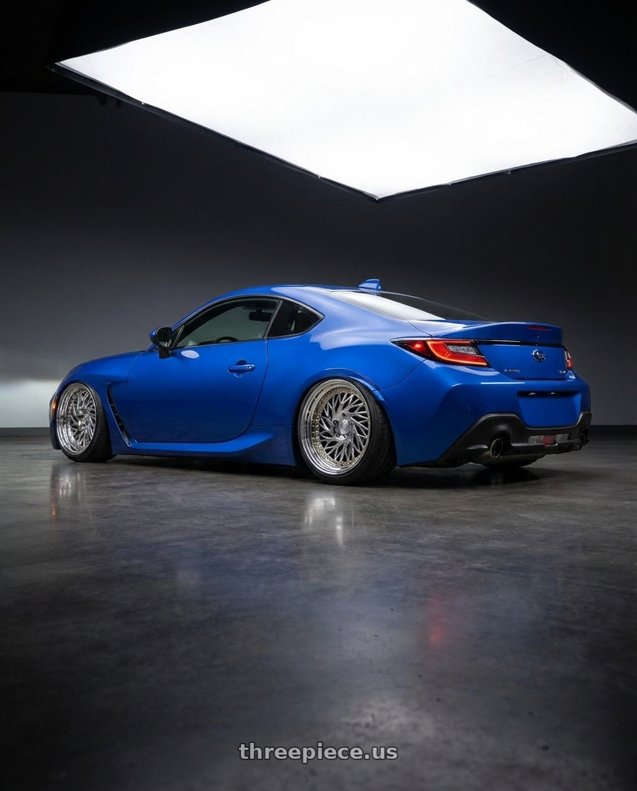 2024 Subaru BRZ with Aodhan DS03 5x114.3 18x9.5 +30 Vacuum Chrome w/Gold Rivets wheels rear three quarter view slight stretch tires