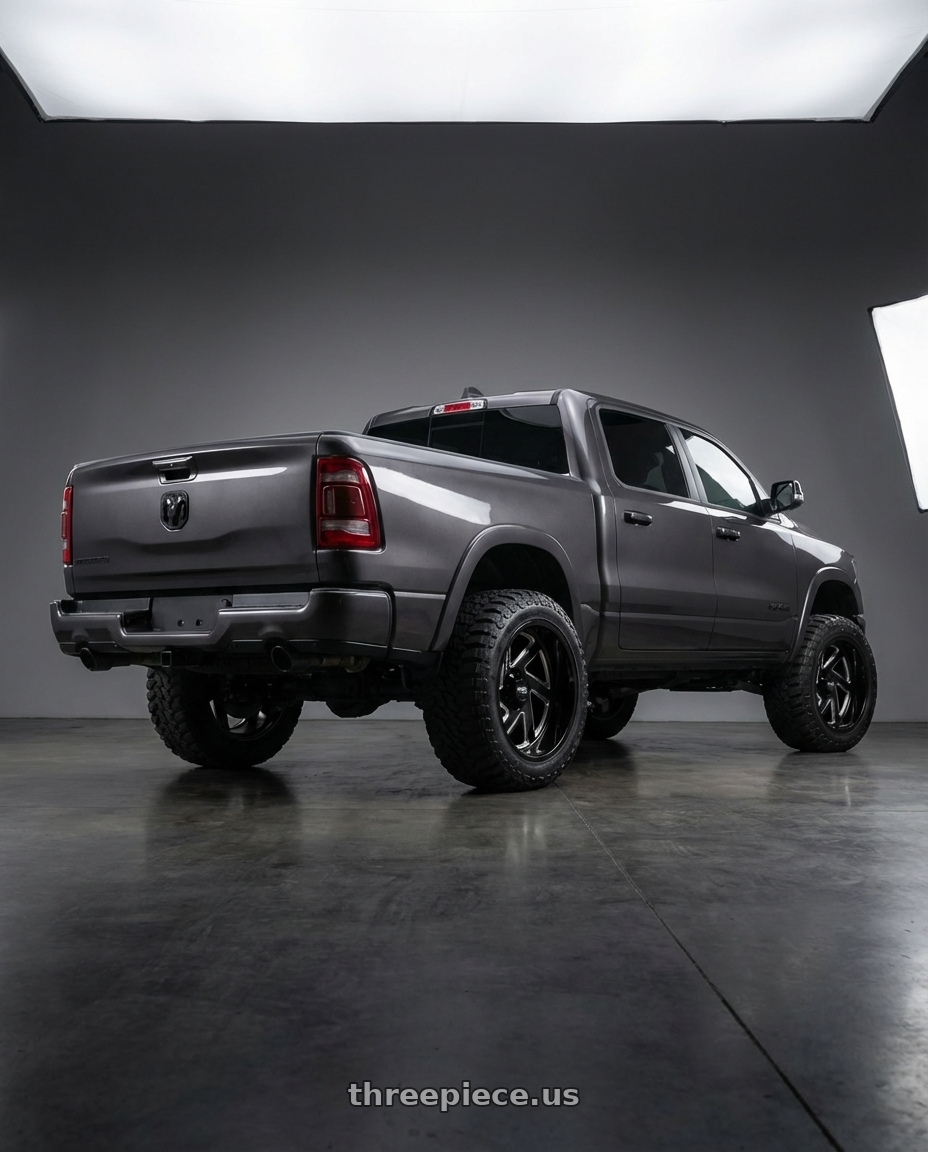 2024 Ram 1500 with Moto Metal MO400 6X139.7 22X14 -76 GLOSS BLACK MILLED wheels rear three quarter view meaty tires