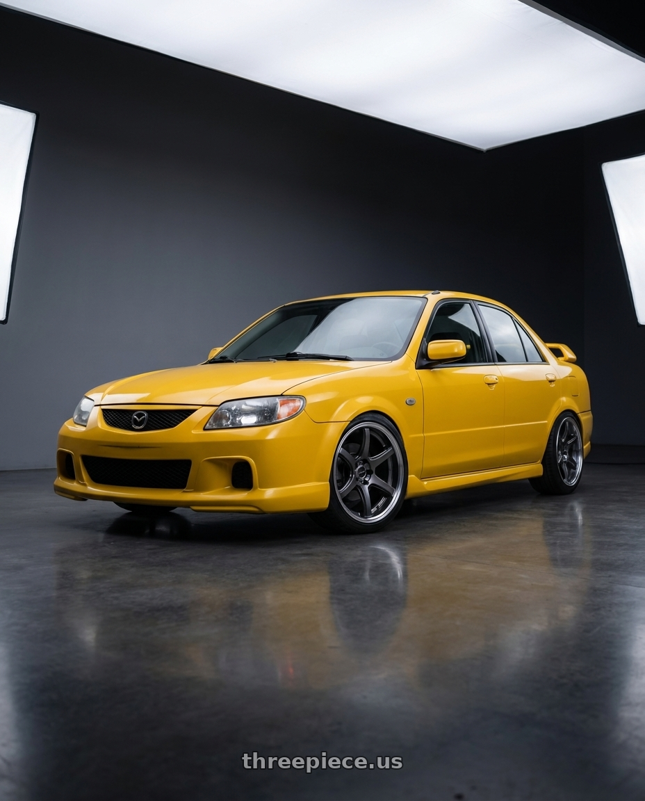 2003 Mazda Protege Mazdaspeed yellow with Work Emotion T7R 2P wheels