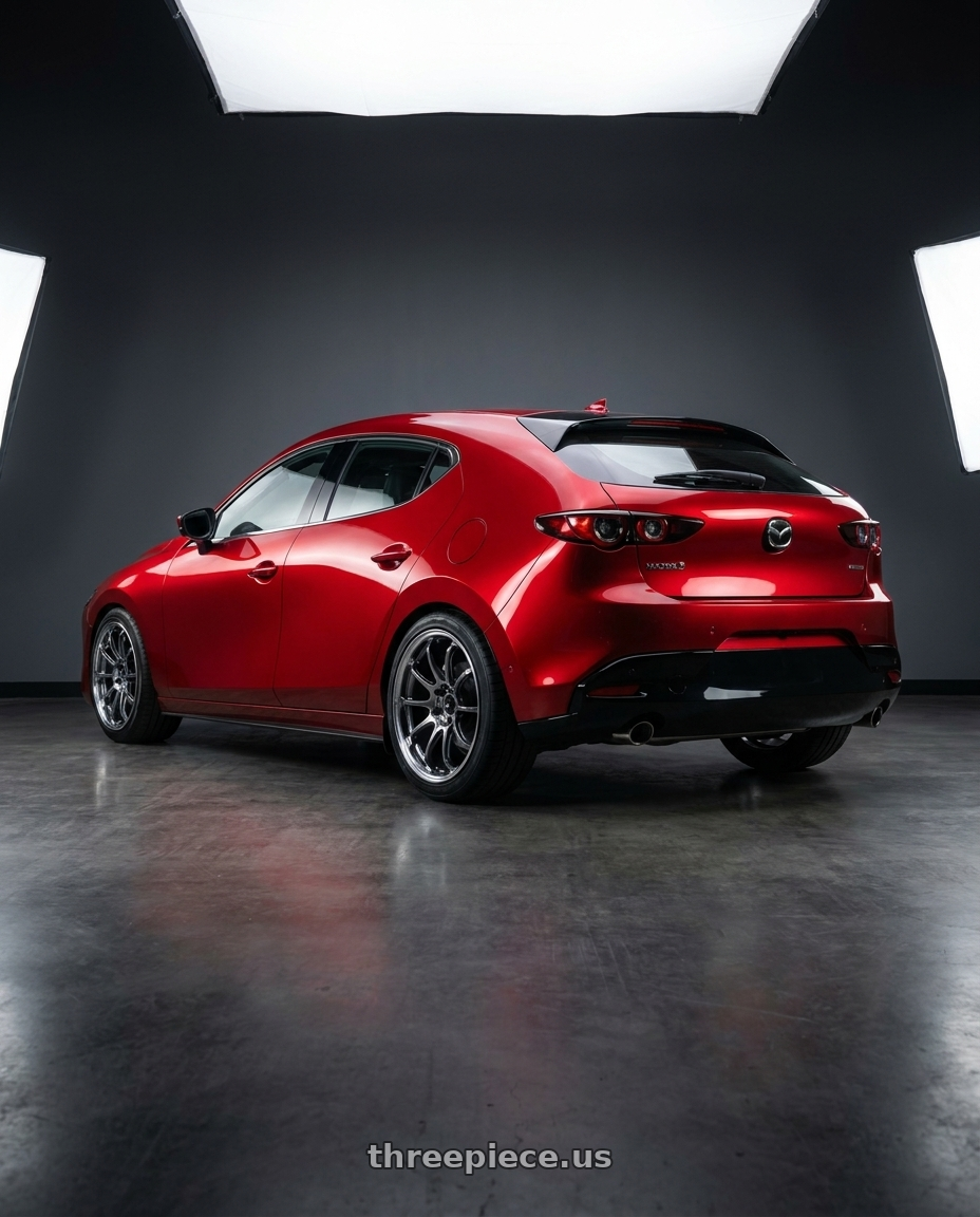 2024 Mazda 3 with Advan Racing RZ-DF2 5x114.3 19x8.5 +45 DIAMOND CUT & HYPER PLATINUM BLACK wheels rear three quarter view slight stretch tires