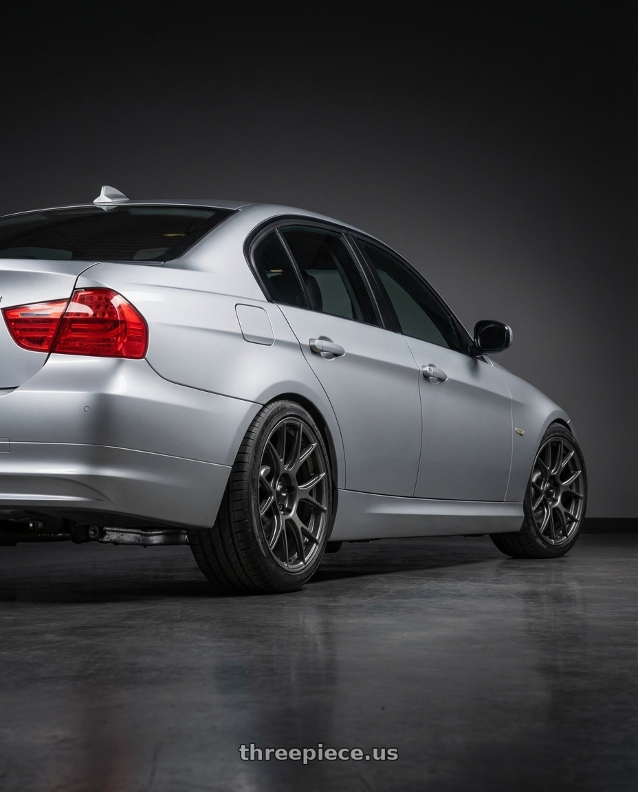 2012 BMW 3 Series E92 with Konig Ampliform 5x120 18x8.5+32 Dark Metallic Graphite wheels rear three quarter view square tires