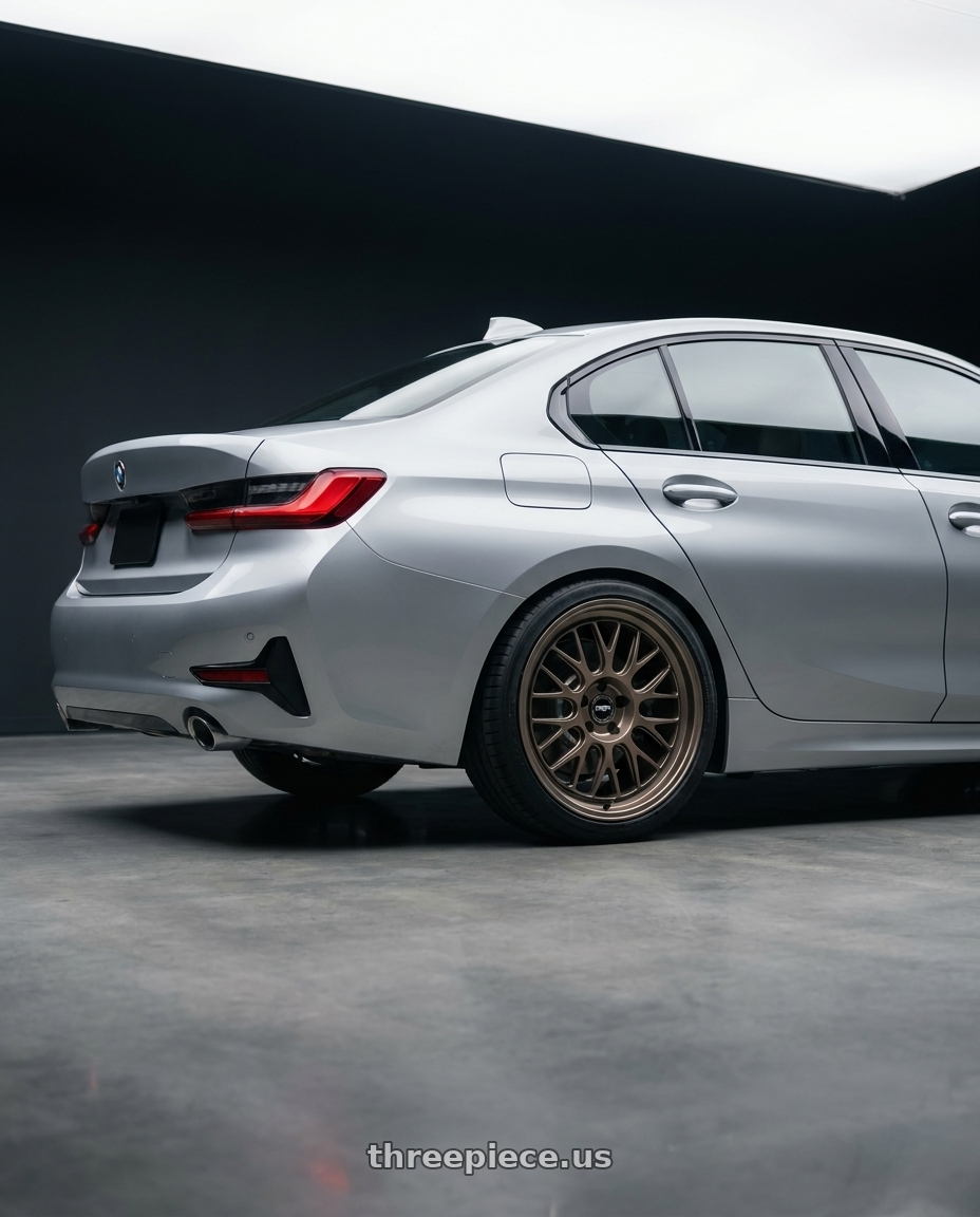 2023 BMW 3 Series G20 with fifteen52 HOLESHOT 5x112 19x8.5 +45 MAGNESIUM GREY (SATIN BRONZE) wheels rear three quarter view square tires