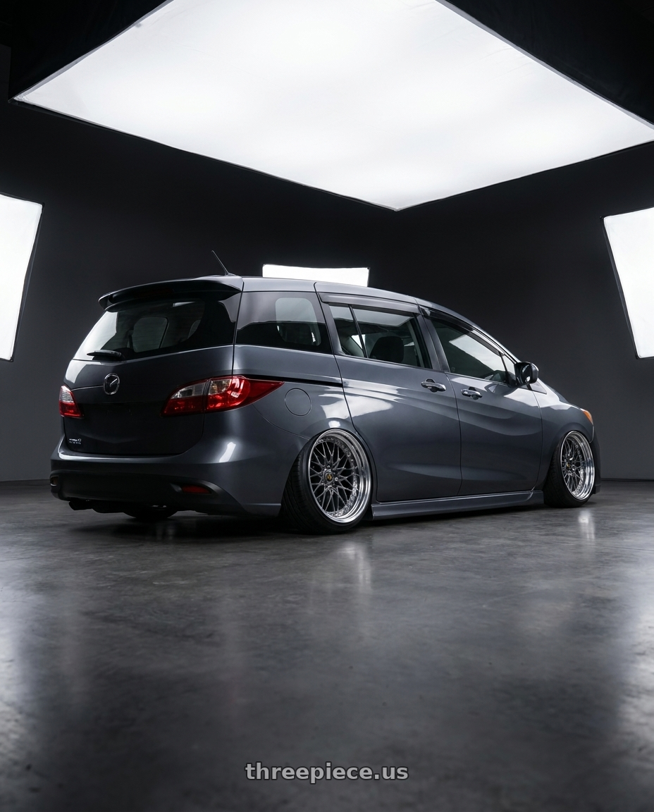 2012 Mazda 5 with Work Vs-Xv 5x100 18x10-37 A Disk Brilliant Silver Black wheels rear three quarter view extreme stretch tires