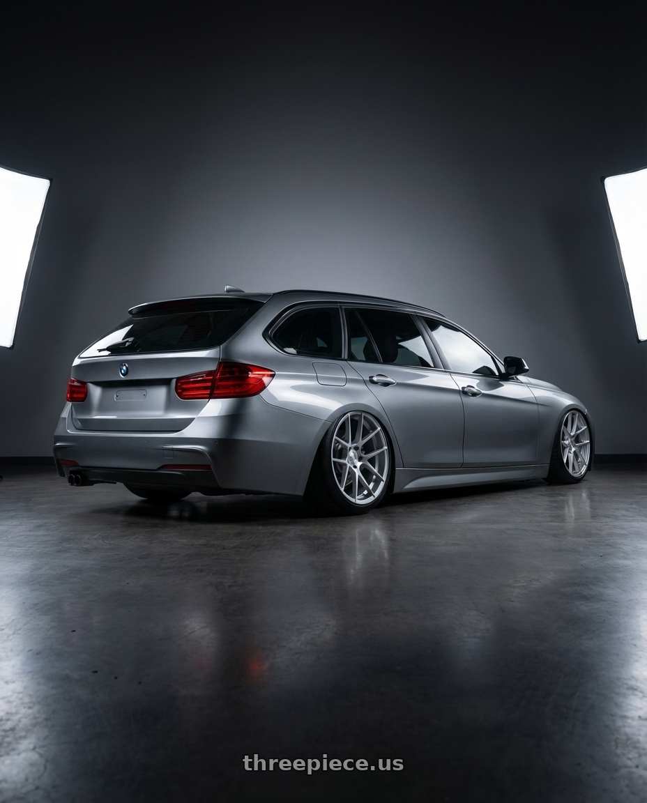 2016 BMW 3 Series F30 with Avant Garde Wheels M510 5X120 19x8.5 +15 Satin Silver wheels rear three quarter view slight stretch tires