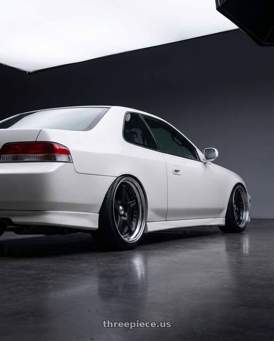 2000 Honda Prelude with SSR Professor SP4 5x114.3 19X9.5 25 HP Disk Flat Black wheels rear three quarter view extreme stretch tires