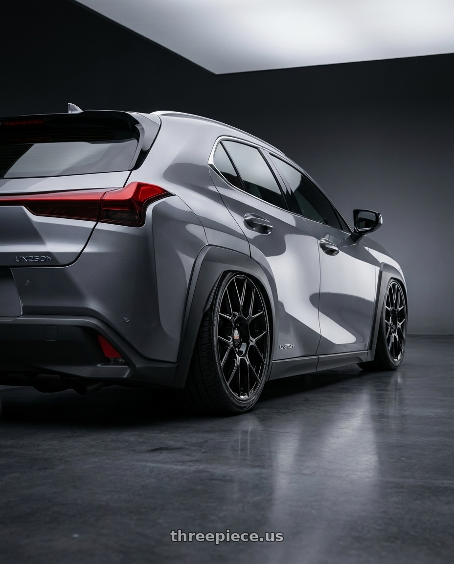2019 Lexus ux250h with BBS XR 5x114.3 18x8.0+40 Gloss Black wheels rear three quarter view slight stretch tires