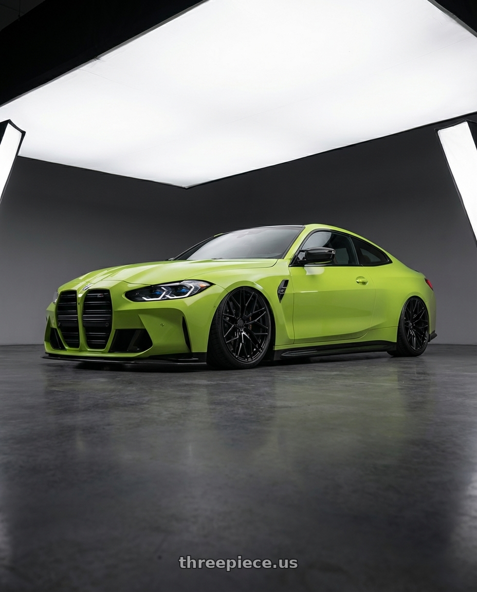 2024 BMW M4 G82 with Avant Garde Wheels M520R 5X112 19x8.5 +35 Gloss Black wheels front three quarter view stanced stance