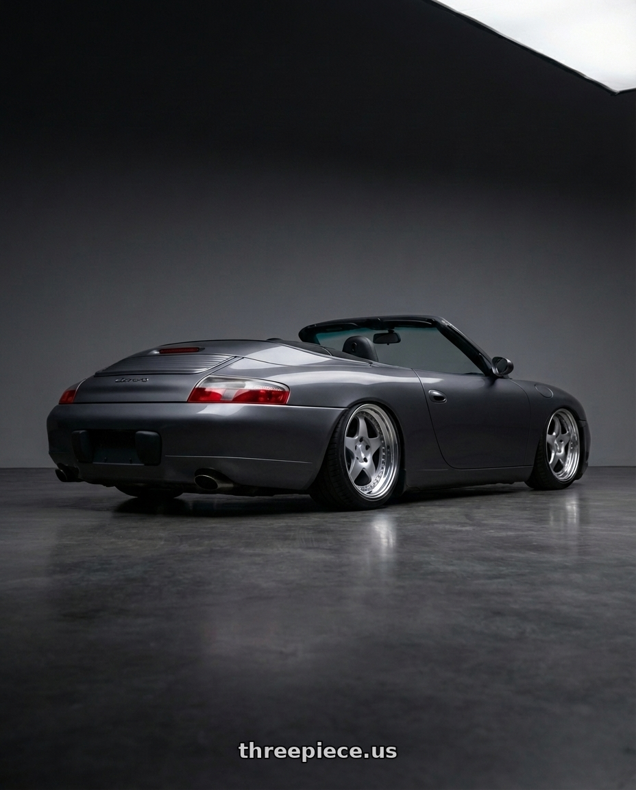 2002 Porsche 911 with Rotiform RC200 NUE 5X120 20x8.5 +35 GLOSS SILVER W/ MACHINED FACE wheels rear three quarter view extreme stretch tires