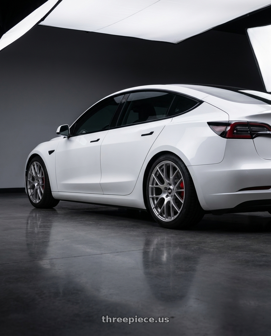 2022 Tesla Model 3 with Enkei Raijin 5x114.3 19x8.5+35 Hyper Silver wheels rear three quarter view square tires