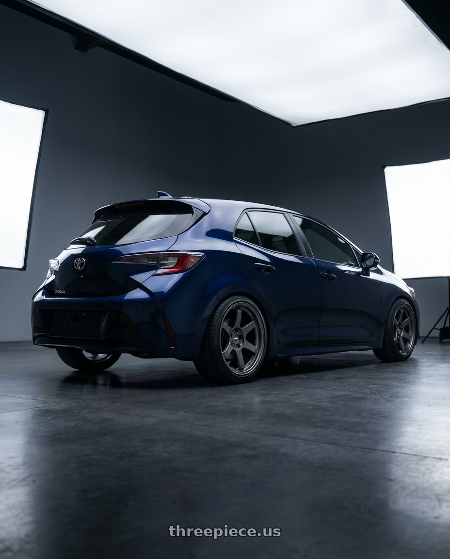 2022 TOYOTA COROLLA with Kansei K11G Tandem 5X100 18x9.5 22 Gunmetal wheels rear three quarter view square tires