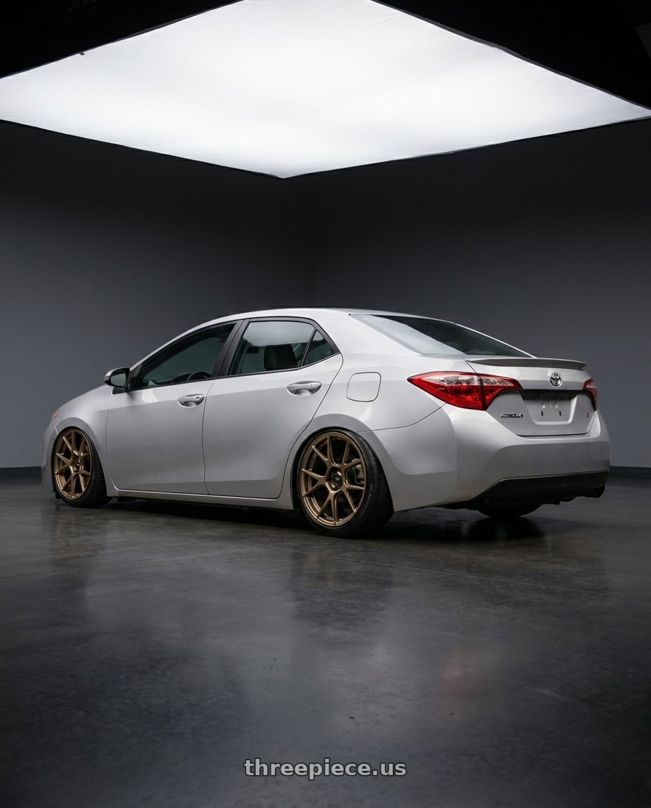 2015 Toyota corolla s with Konig Ampliform 5x120 19x10+28 Gloss Bronze wheels rear three quarter view slight stretch tires