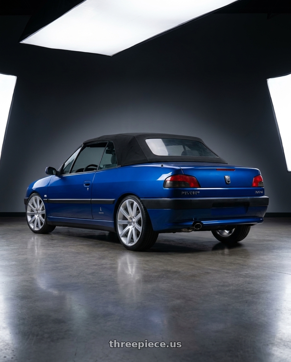 1996 Peugeot 306 Cabriolet (N3)  , Royal Blue with OE Wheels CL02 5x115 22x9+18 Silver wheels rear three quarter view square tires