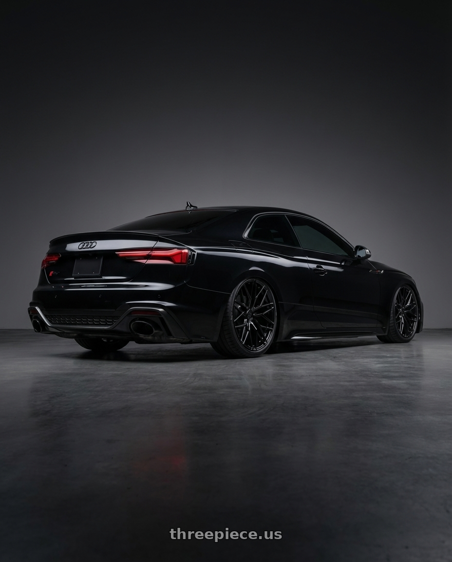 2022 Audi RS5 with Avant Garde Wheels M520R 5X112 20x9 +32 Gloss Black wheels rear three quarter view slight stretch tires