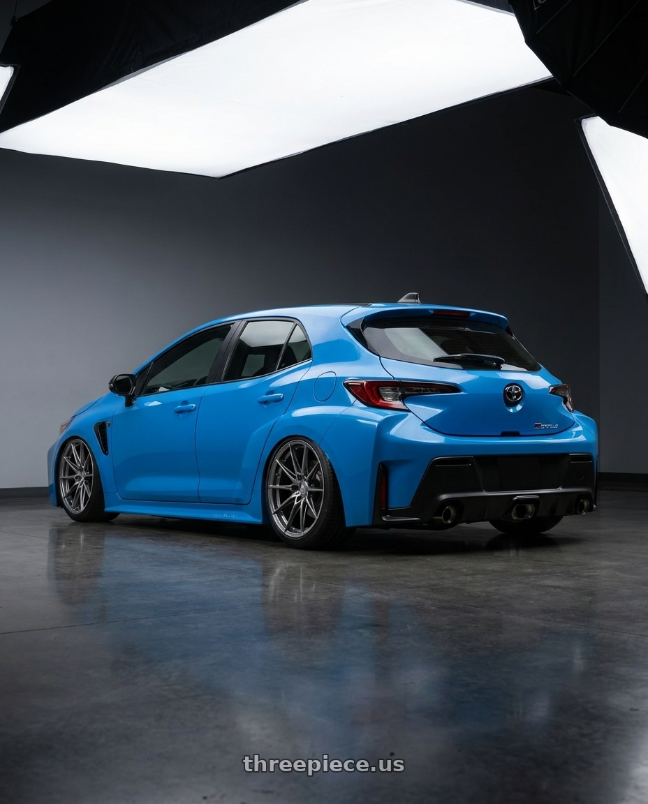 2024 Toyota GR Corolla with Aodhan AH09 5x114.3 18x9.5 +35 Hyper Black wheels rear three quarter view slight stretch tires
