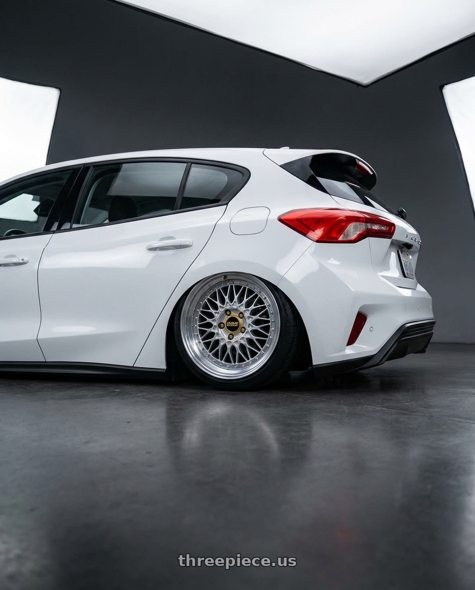 2020 Ford focus with BBS Super 5x112 19x10 +40 Diamond Silver wheels rear three quarter view slight stretch tires