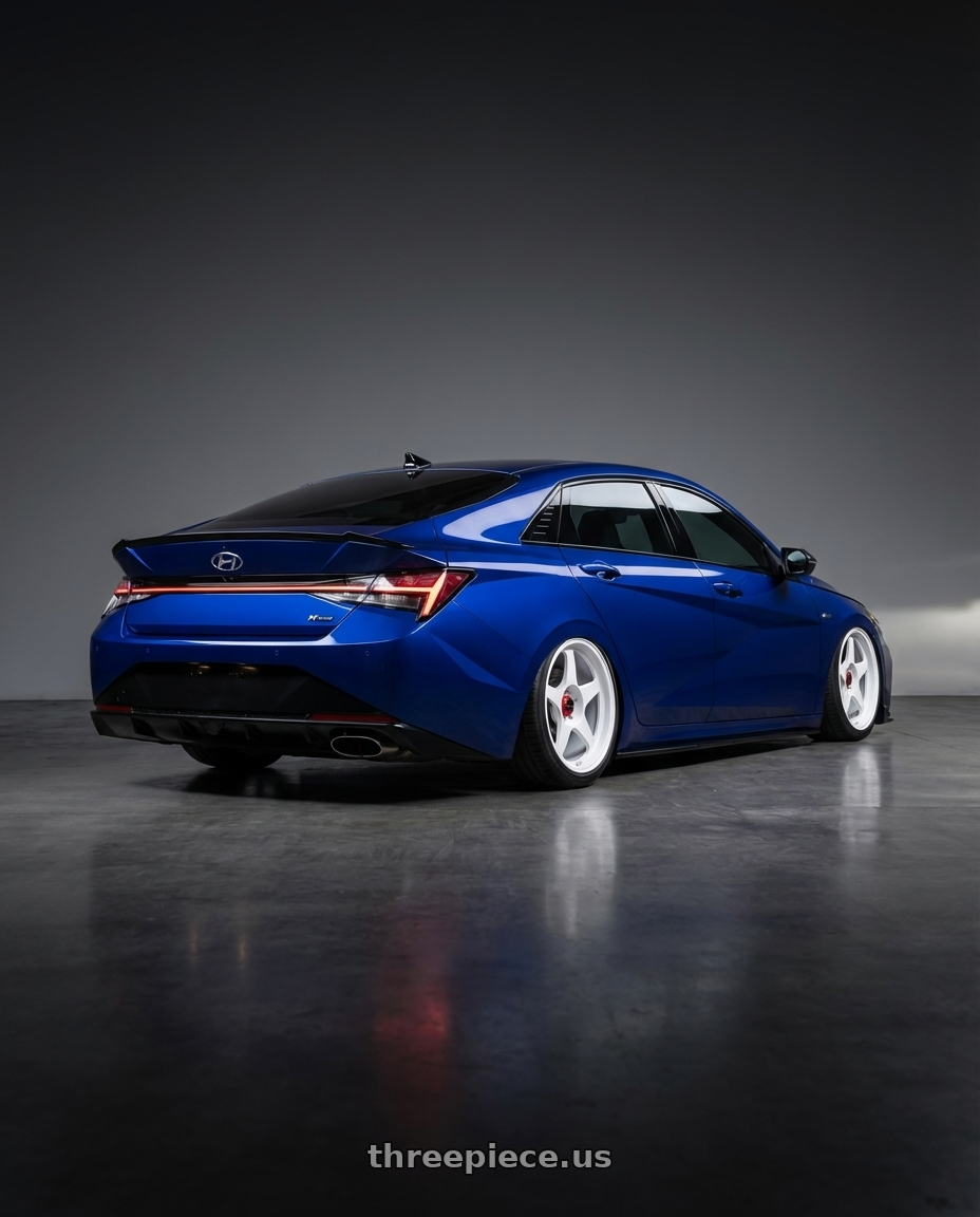 2025 Elantra N Line  with R6061 Forged R1 5x108 18X8.5 +35 Championship White wheels rear three quarter view square tires