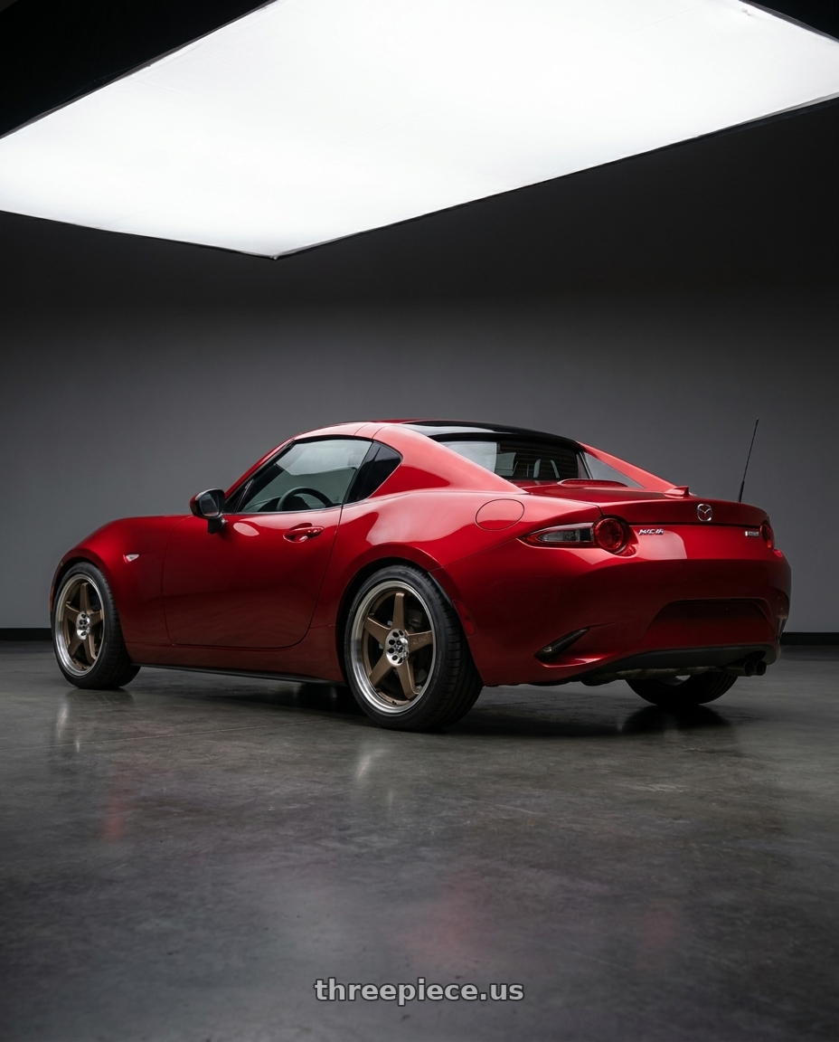 2024 mazda mx5 with Enkei EV5 4x100/114.3 17x7+38 Matte Bronze w/ Machined Lip wheels rear three quarter view square tires