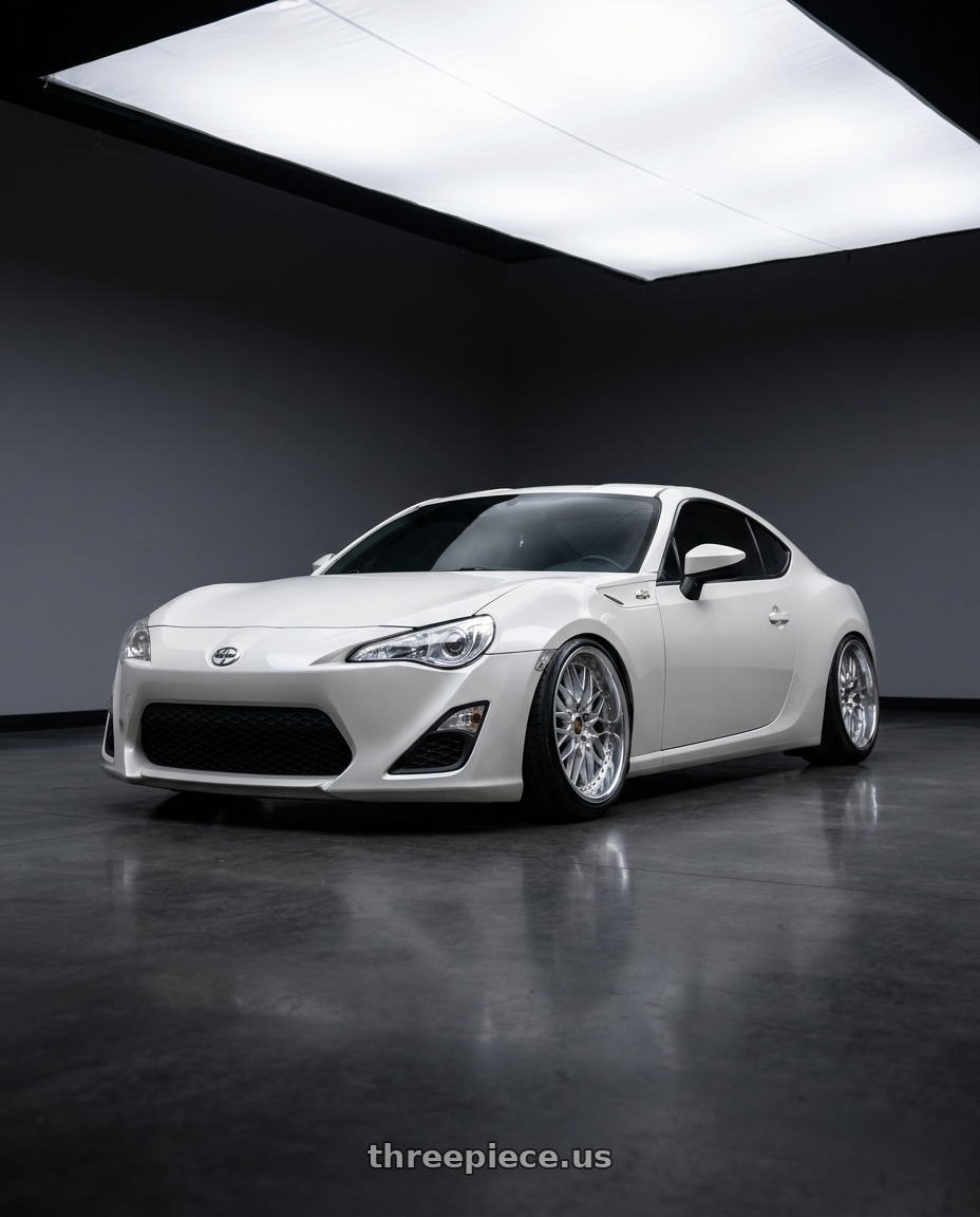 2015 Scion FR-S with Work Vs-Xv 5x100 18x8.5+14 O Disk Silky Rich Silver wheels front three quarter view lowered stance