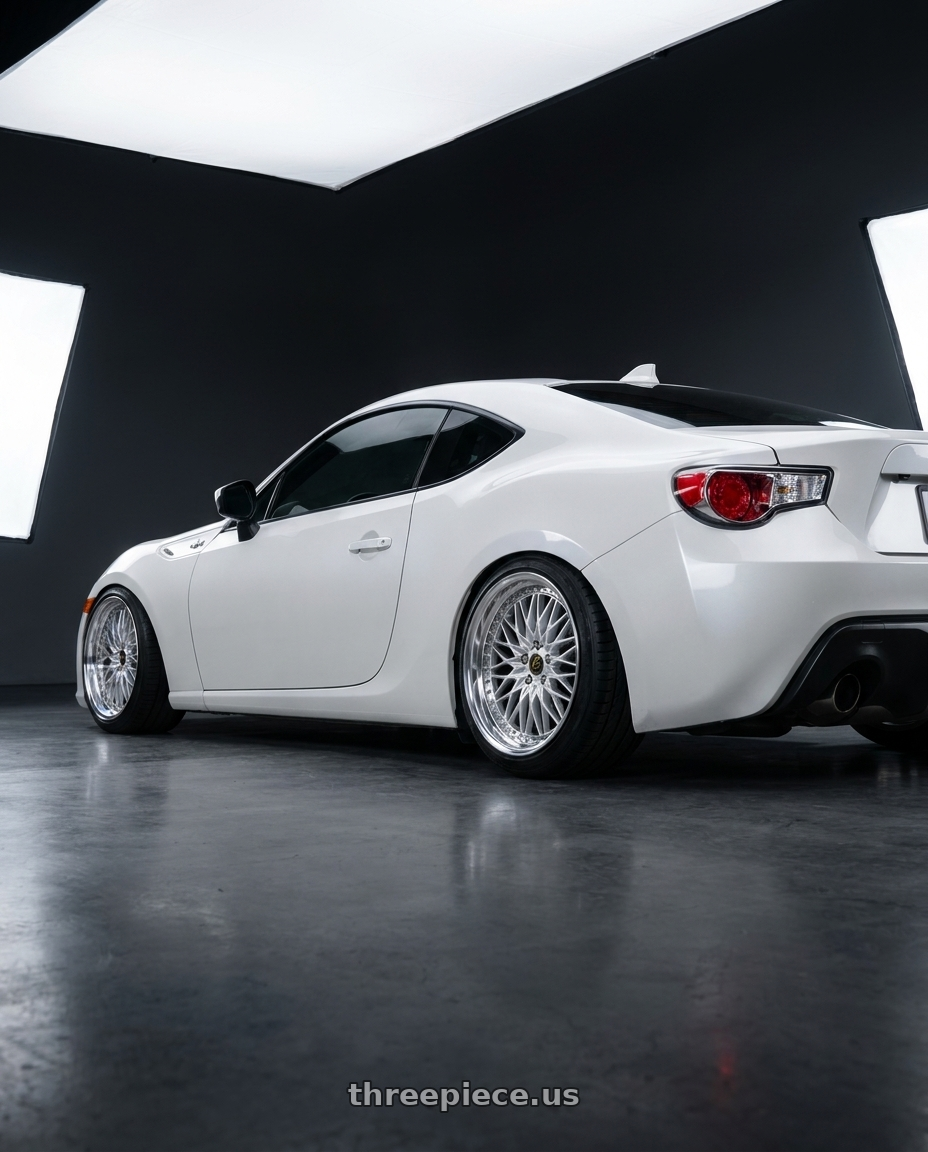 2015 Scion FR-S with Work Vs-Xv 5x100 18x8.5+14 O Disk Silky Rich Silver wheels rear three quarter view slight stretch tires
