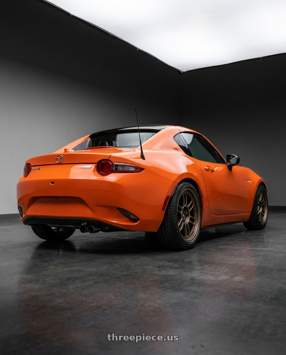 2019 mazda mx5 rf 30th anniversary with Enkei RPF1 4x100 15x8+28 Bronze wheels rear three quarter view slight stretch tires