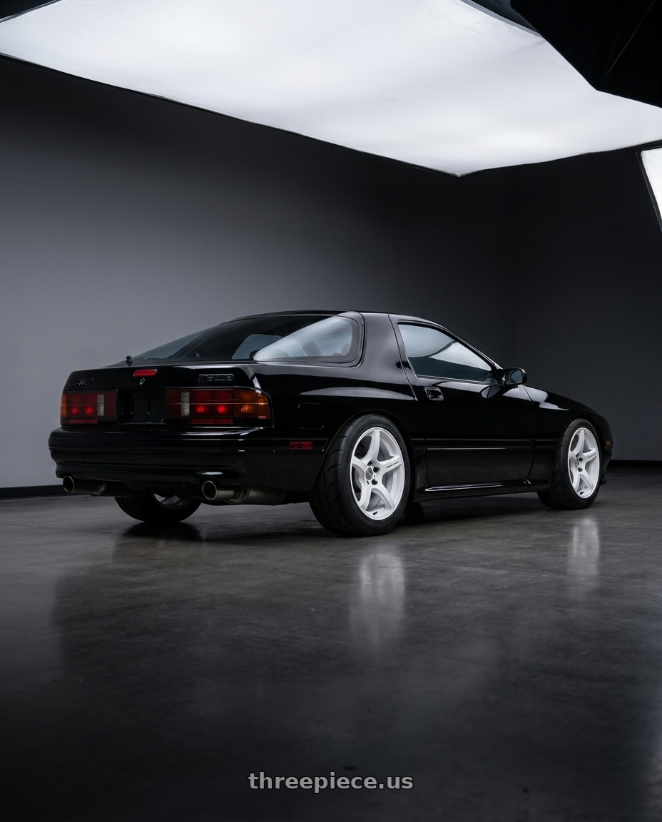 1988 MAZDA RX7 SE Black with Work Emotion T5r 5x114.3 17x9 +22 Ice White wheels rear three quarter view meaty tires