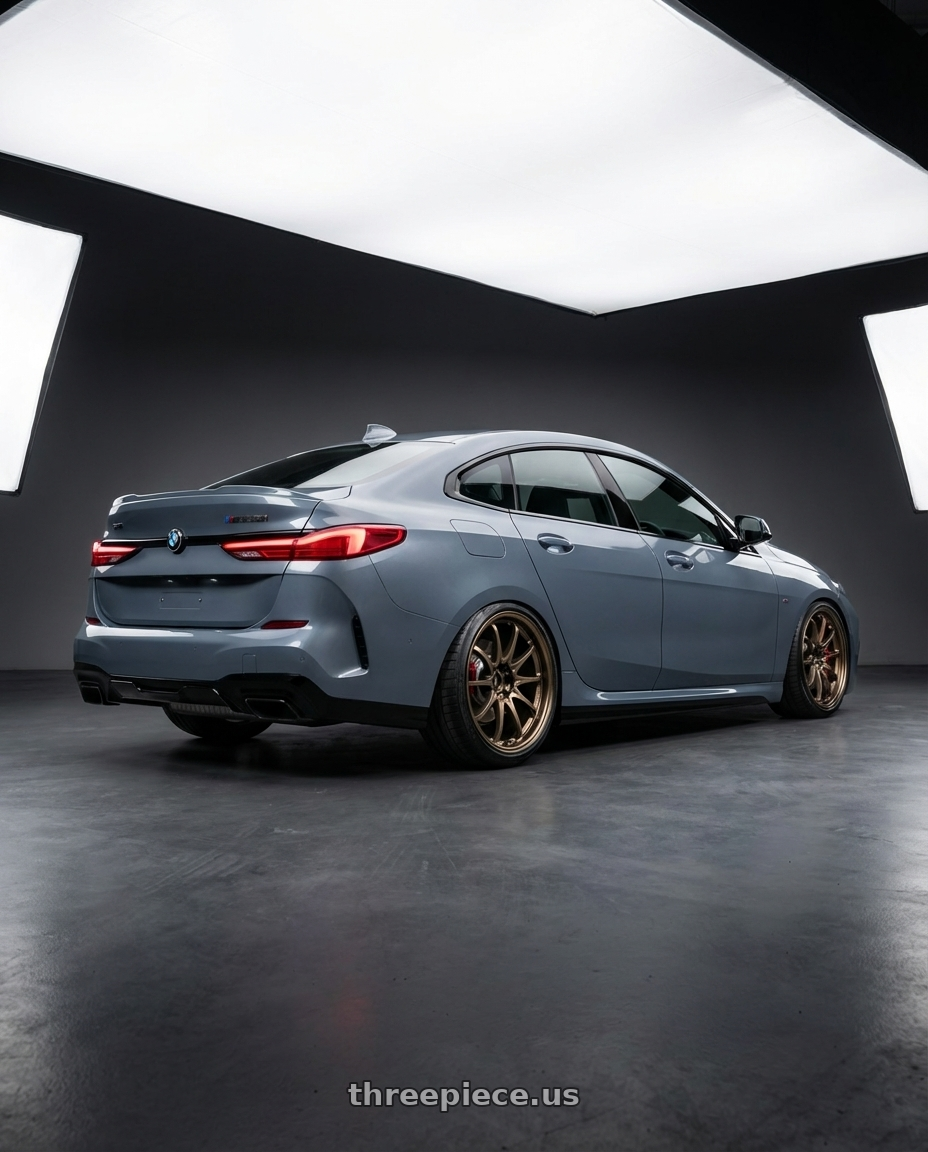 2021 BMW M235i xDrive, Storm Bay Metallic with Volk Racing CE28N-PLUS 5x112 18x10.5 +34 SHINING BRONZE METAL wheels rear three quarter view extreme stretch tires