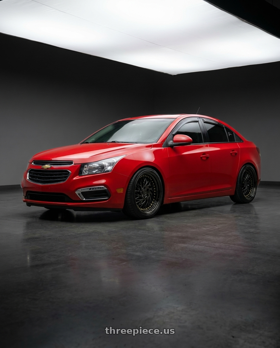 2015 Chevy cruze with Aodhan DS03 5x100 18x9.5 +35 Black Vacuum w/ Gold Rivets wheels