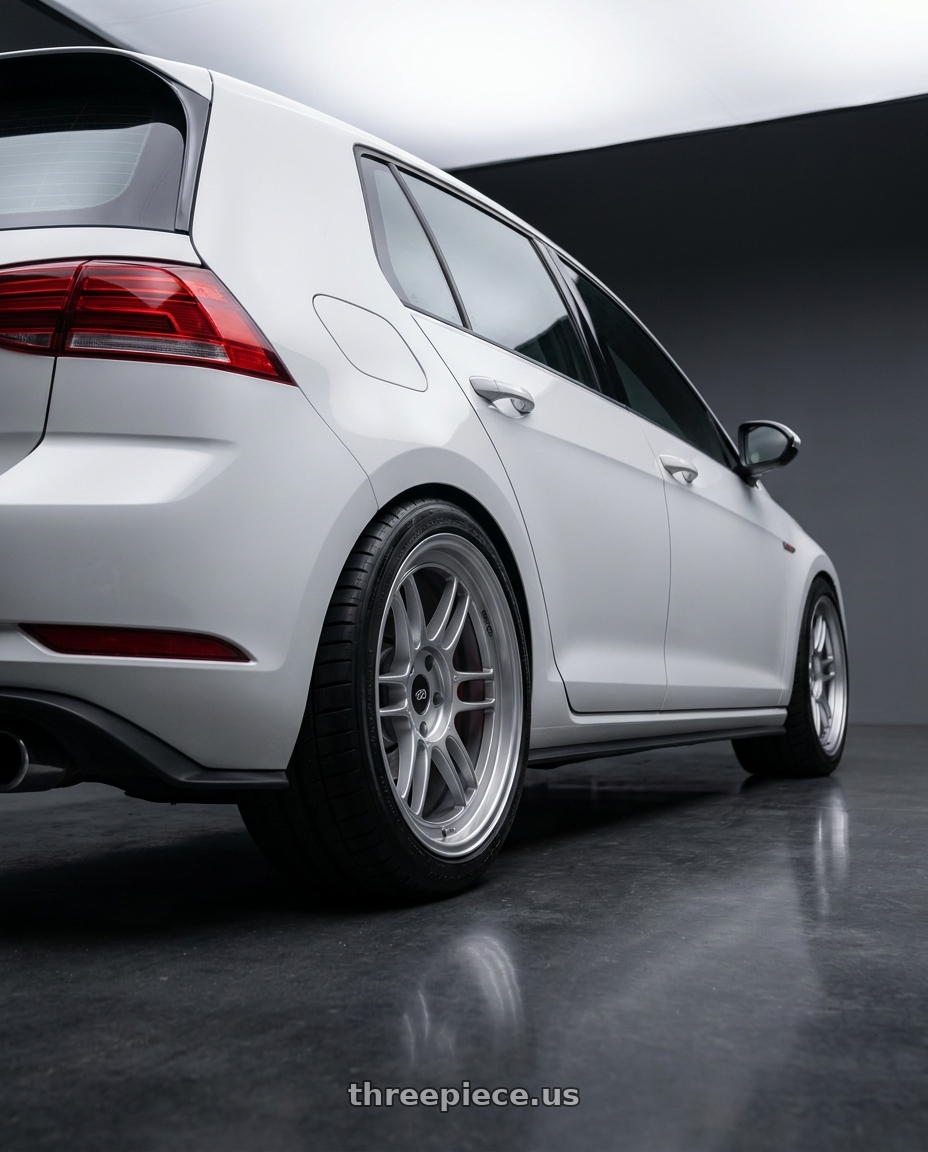 2021 Volkswagen GTI S with Enkei RPF1 5x112 18x9+35 Silver wheels rear three quarter view square tires
