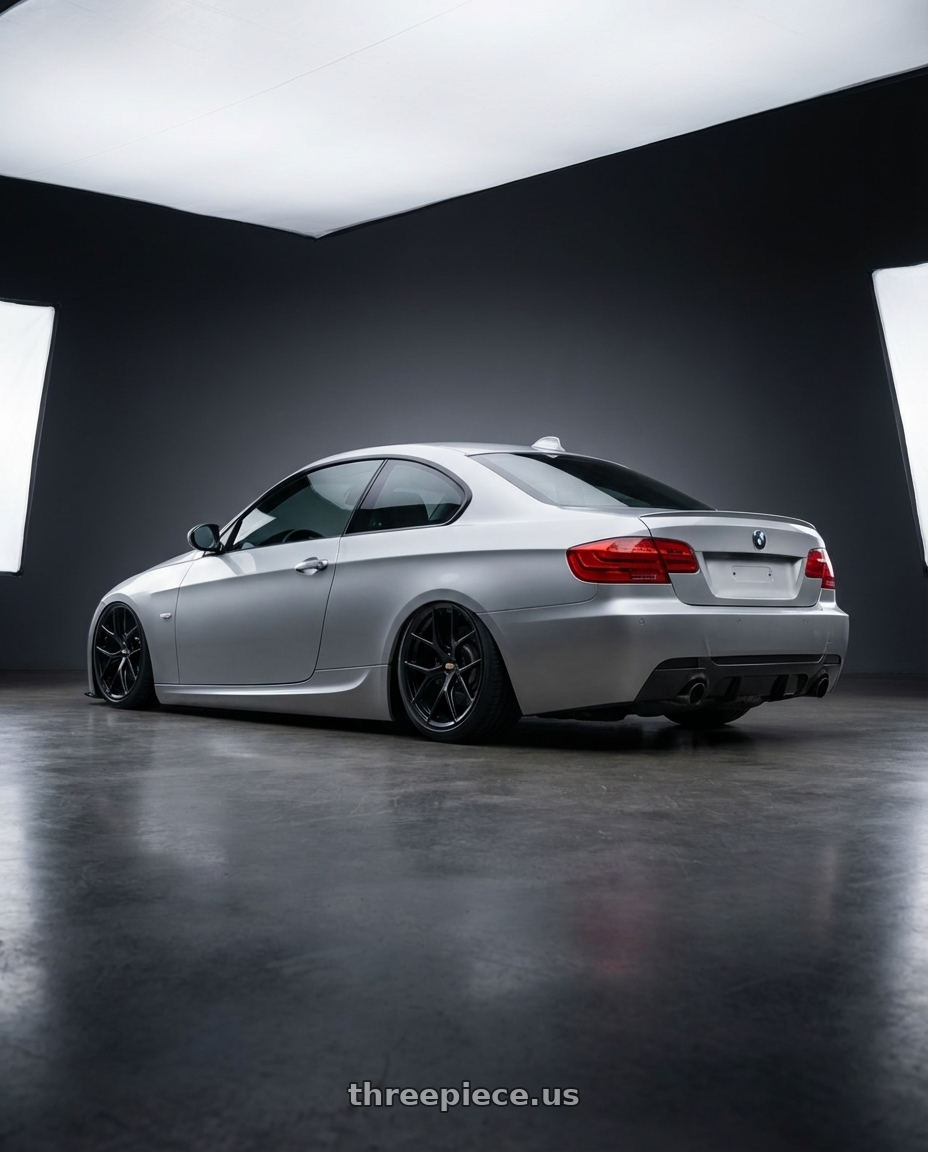 2012 BMW 3 Series E92 with BBS FI-R 5x120 19x9.5+22 Satin Black wheels rear three quarter view slight stretch tires