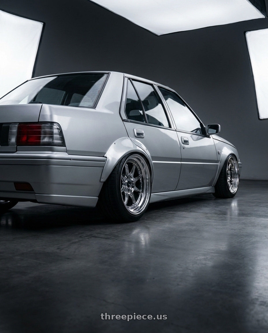 1998 Proton Iswara with Konig Countergram 5x108 19x8.5+43 Hyper Chrome / Machined Lip wheels rear three quarter view slight stretch tires
