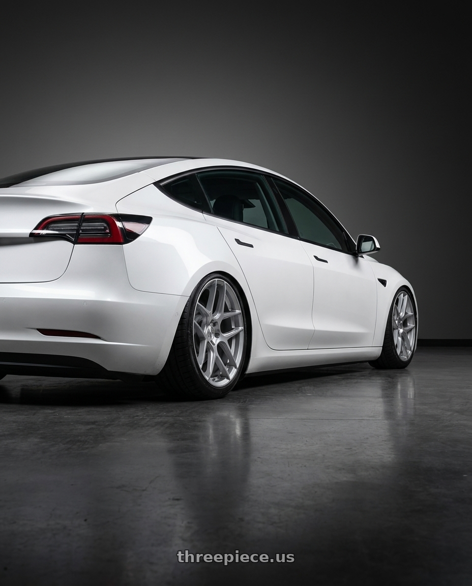 2023 Tesla Model 3 with Aodhan AFF2 5x114.3 19x8.5+35 Gloss Silver Machined Face wheels rear three quarter view slight stretch tires