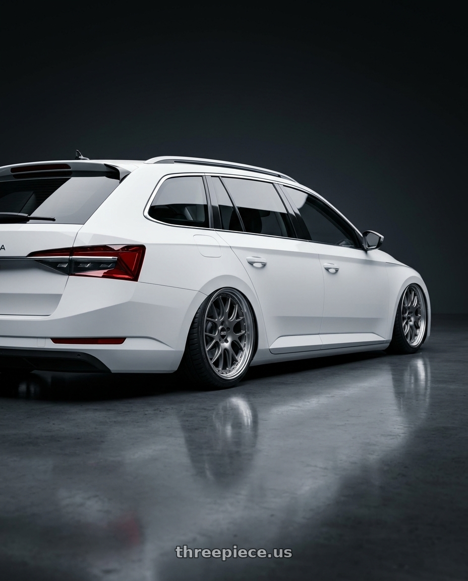 2022 Superb combi with BBS CH-R 5x112 20x9 +25 Satin Titanium Polished Rim Protector wheels rear three quarter view slight stretch tires
