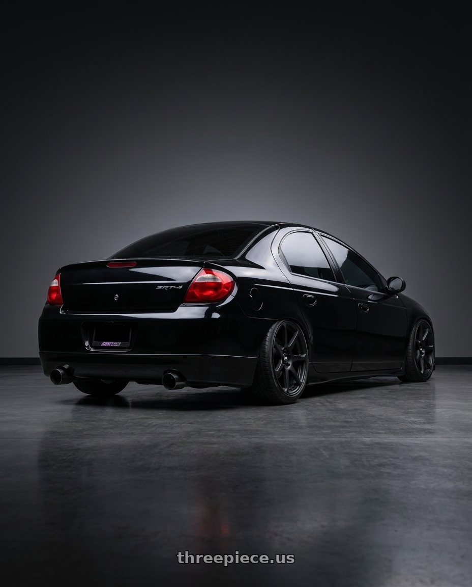 2005 dodge srt4 with Motegi MR154 BATTLE 5X100 17X8 +43 MATTE BLACK wheels rear three quarter view slight stretch tires
