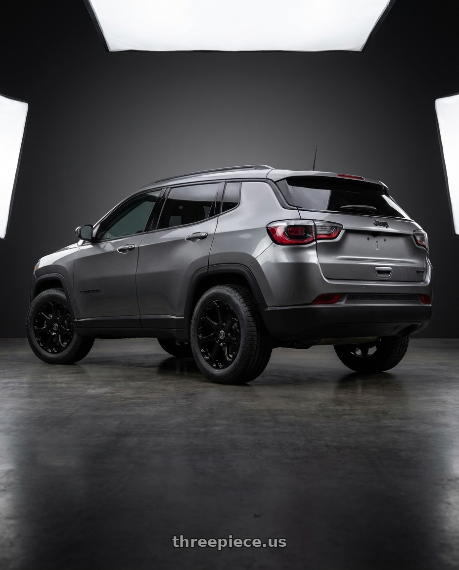 2025 Jeep Compass with Heritage Wheel KOKORO 5x110 17x8 +25 Gblk wheels rear three quarter view meaty tires