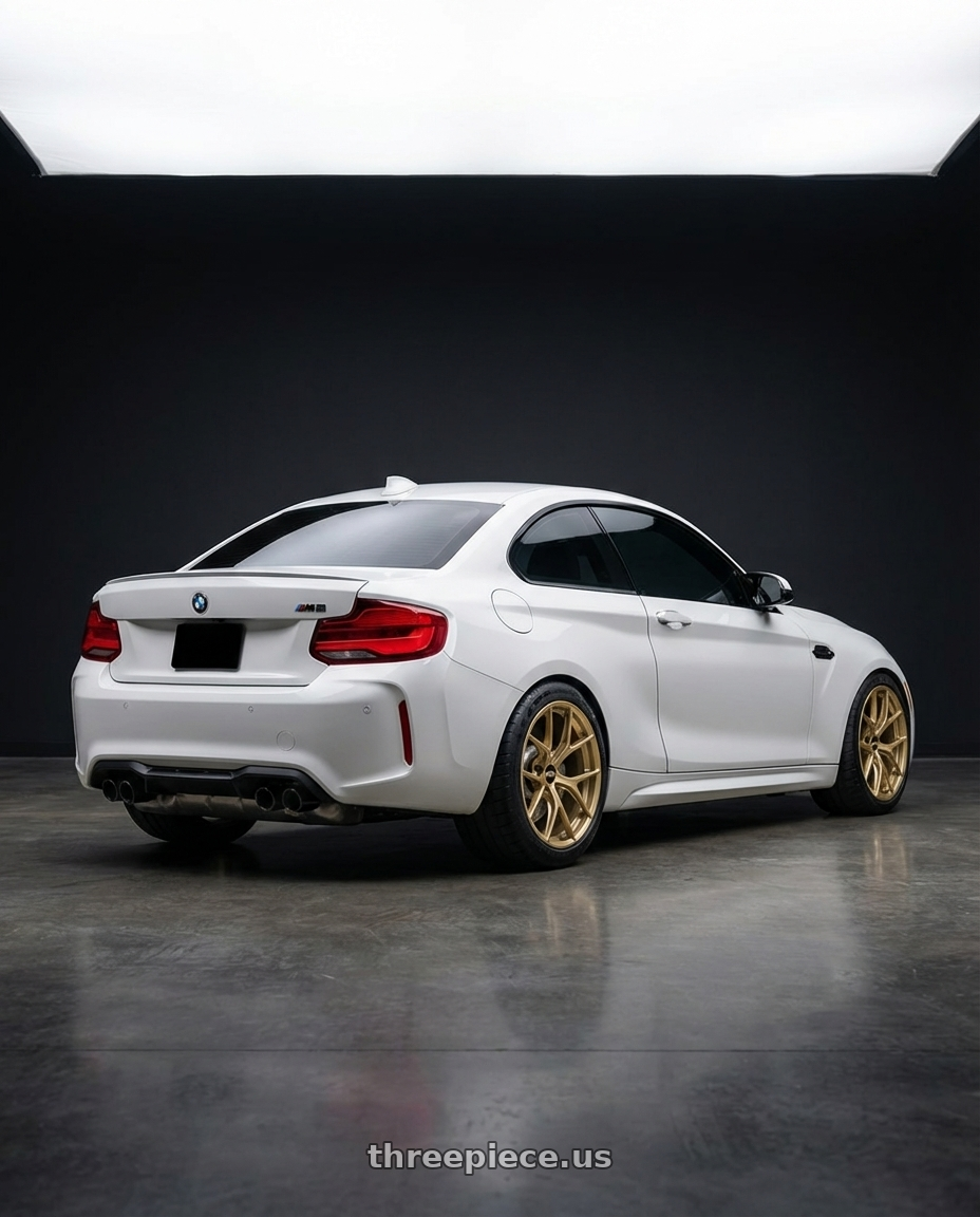 2022 BMW M2 with BBS FI-R 5x120 19x9.5+22 Gold wheels rear three quarter view meaty tires